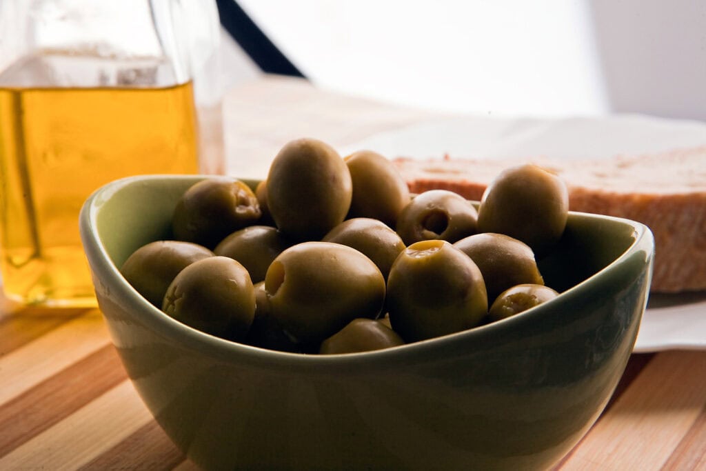 Cold Pressed Olives And Oil Bottle