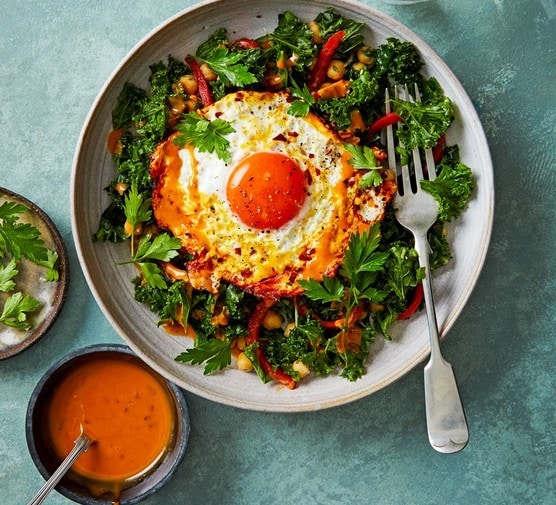 Tumeric Fried Eggs And Kale Salad With Olive Oil