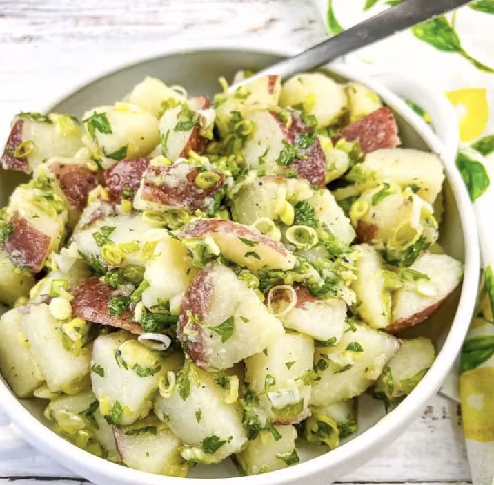 Salad With Extra Virgin Olive Oil In Potato And Green Garlic Salad